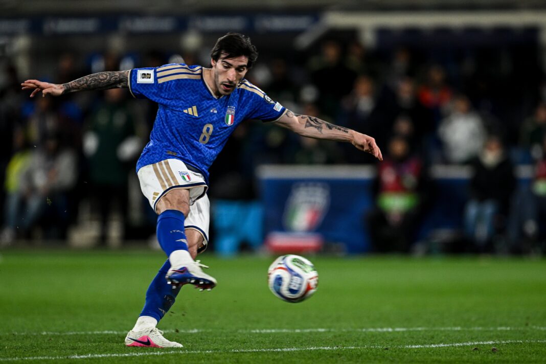 Los escudos de las selecciones de Italia y Bosnia y Herzegovina frente a frente.